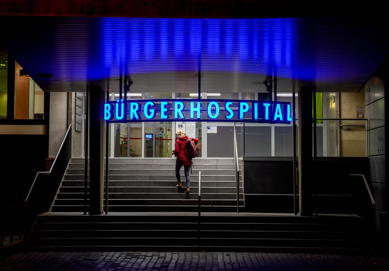 Lorenz Nowak, head physician of the Clinic for Intensive Care Medicine, treats a COVID-19 patient in the ICU of the Asklepios Clinic, in Gauting, Germany, Friday, Nov. 19, 2021. The head of Germany’s disease control agency said Friday that the country has entered into a “nationwide state of emergency” because of surging coronavirus infections. The head of the Robert Koch Institute said regular medical care cannot be guaranteed anymore in some parts of the country because hospitals and intensive care wards are overstretched. (Matthias Balk/dpa via AP)