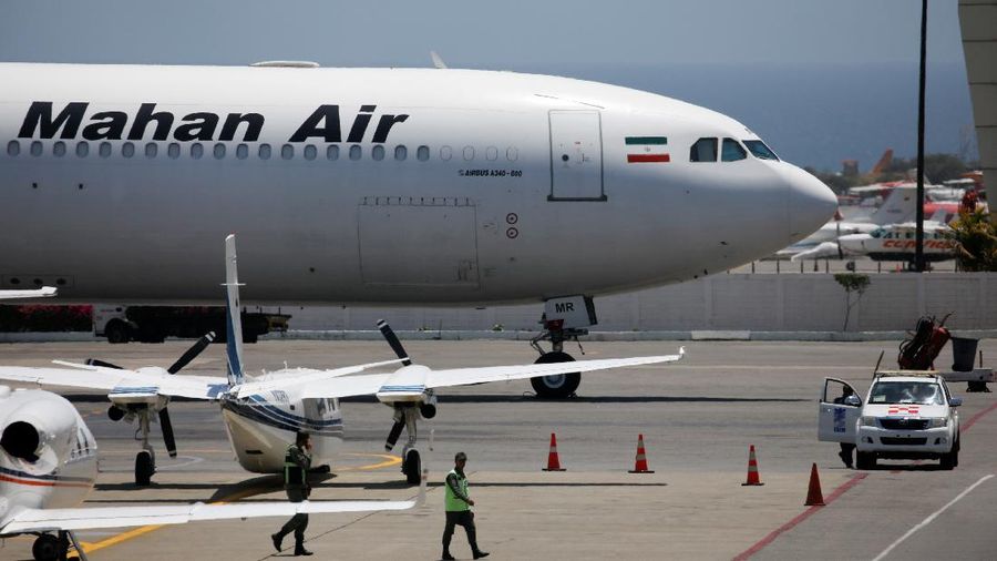 FILE PHOTO: An Airbus A340-600 airplane of Mahan Air is seen at Simon Bolivar International Airport outside Caracas, Venezuela April 8, 2019. REUTERS/Carlos Garcia Rawlins/File Photo