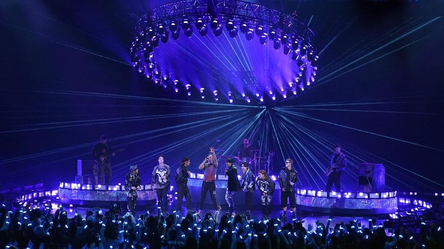Coldplay and BTS perform during the Annual American Music Awards at the Microsoft Theatre in Los Angeles, California, U.S., November 21, 2021. REUTERS/Mario Anzuoni