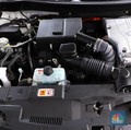 Pengunjung melihat kendaraan Mitsubishi Outlander PHEV  yang di pamerkan di ajang Indonesia Electric Motor Show (IEMS) 2021, yang digelar oleh Badan Riset dan Inovasi Nasional (BRIN), 2426 November 2021, di Puspitek Serpong, Tangerang Selatan, Banten