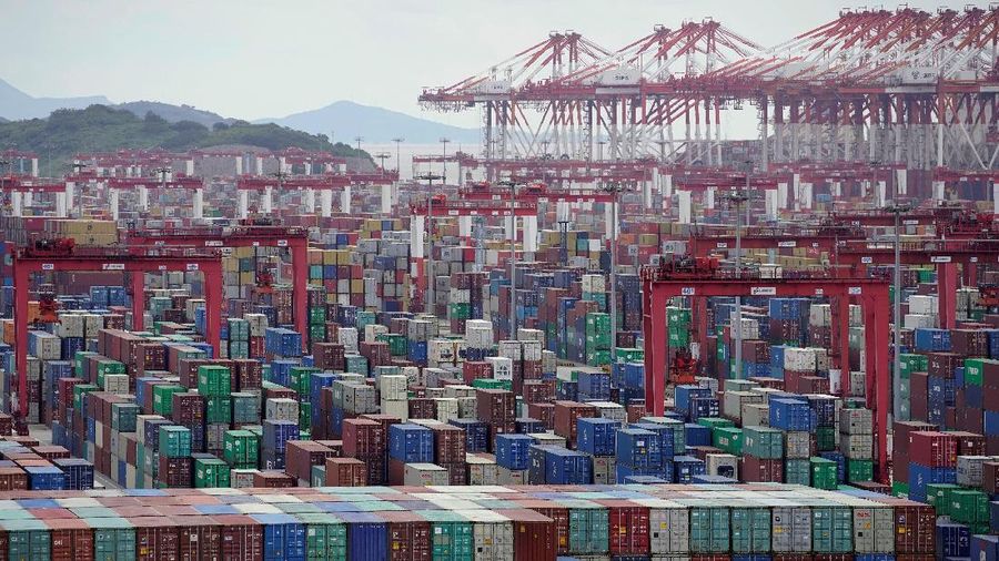 FILE PHOTO: Containers are seen at the Yangshan Deep-Water Port in Shanghai, China October 19, 2020. REUTERS/Aly Song/File Photo/File Photo
