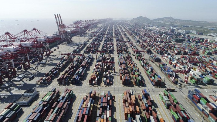 This April 23, 2017, photo released by Xinhua News Agency, shows a container dock of Yangshan Port in Shanghai, east China. U.S. President Donald Trump's latest tariff hikes on Chinese goods took effect Friday, May 10, 2019 and Beijing said it would retaliate, escalating tensions in fight over China's technology ambitions and other trade strains. (Ding Ting/Xinhua via AP)