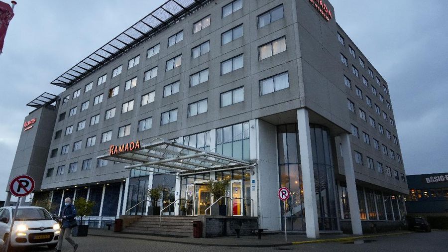 Exterior view of the hotel in Badhoevedorp near Schiphol Airport, Netherlands, where Dutch authorities have isolated 61 people who tested positive for COVID-19 on two arriving flights originating from South Africa, Saturday, Nov. 27, 2021. Authorities are carrying out further investigations to see if any of the travelers have the omicron variant. (AP Photo/Peter Dejong)
