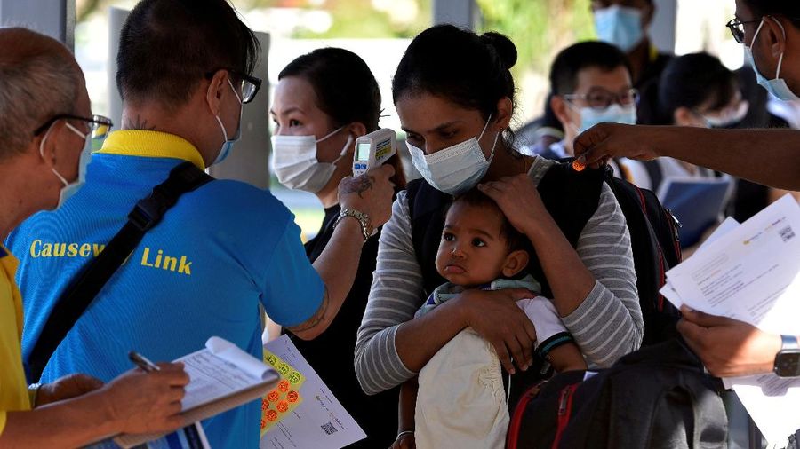 Singapura, Malaysia membuka kembali perbatasan darat di tengah kekhawatiran atas varian Omicron. (REUTERS/CAROLINE CHIA)