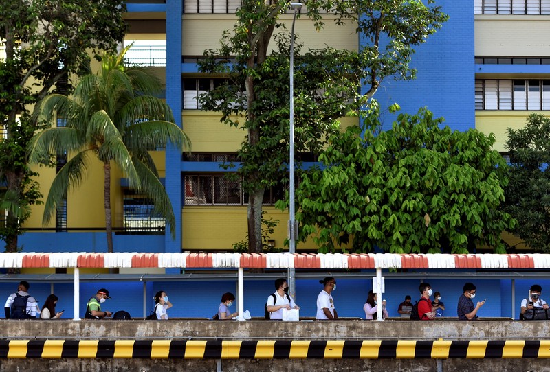 Singapura, Malaysia membuka kembali perbatasan darat di tengah kekhawatiran atas varian Omicron. (REUTERS/CAROLINE CHIA) Singapura, Malaysia membuka kembali perbatasan darat di tengah kekhawatiran atas varian Omicron. (REUTERS/CAROLINE CHIA)