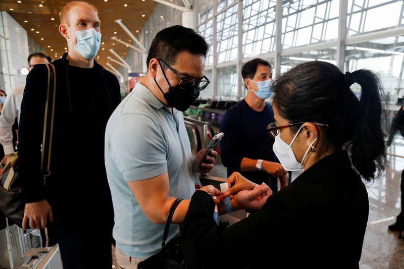 Singapura, Malaysia membuka kembali perbatasan darat di tengah kekhawatiran atas varian Omicron. (REUTERS/CAROLINE CHIA) Singapura, Malaysia membuka kembali perbatasan darat di tengah kekhawatiran atas varian Omicron. (REUTERS/CAROLINE CHIA)