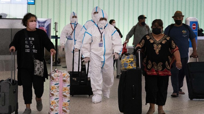 Kemunculan kasus virus Omicron di Amerika Serikat. (AP/Jae C. Hong) Kemunculan kasus virus Omicron di Amerika Serikat. (AP/Jae C. Hong)