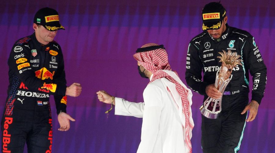 People watch fireworks at the end of the Formula One Saudi Arabian Grand Prix in Jiddah, Sunday, Dec. 5, 2021. AP Photo/Hassan Ammar)