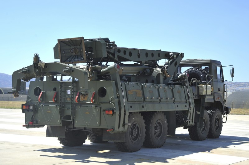 US Turkey FILE - In this Tuesday, Aug. 27, 2019 file photo, a truck carrying parts of the S-400 air defense systems, exits a Russian transport aircraft after landing at Murted military airport outside Ankara, Turkey. The Trump administration is imposing sanctions on its NATO ally Turkey over its purchase of a Russian air defense system. The move comes at a delicate time in relations between Washington and Ankara. The countries have been at odds over Turkey's acquisition from Russia of the S-400 missile defense system. (Turkish Defence Ministry via AP, Pool, File)
