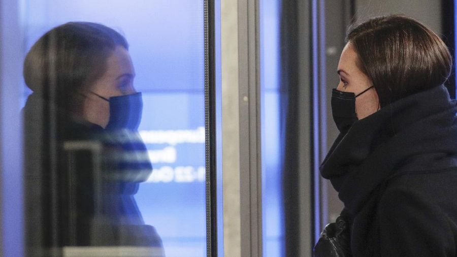 Finland's Prime Minister Sanna Marin leaves after a first day of meetings at an EU summit in Brussels, Friday, Oct. 22, 2021. (Olivier Hoslet, Pool Photo via AP)