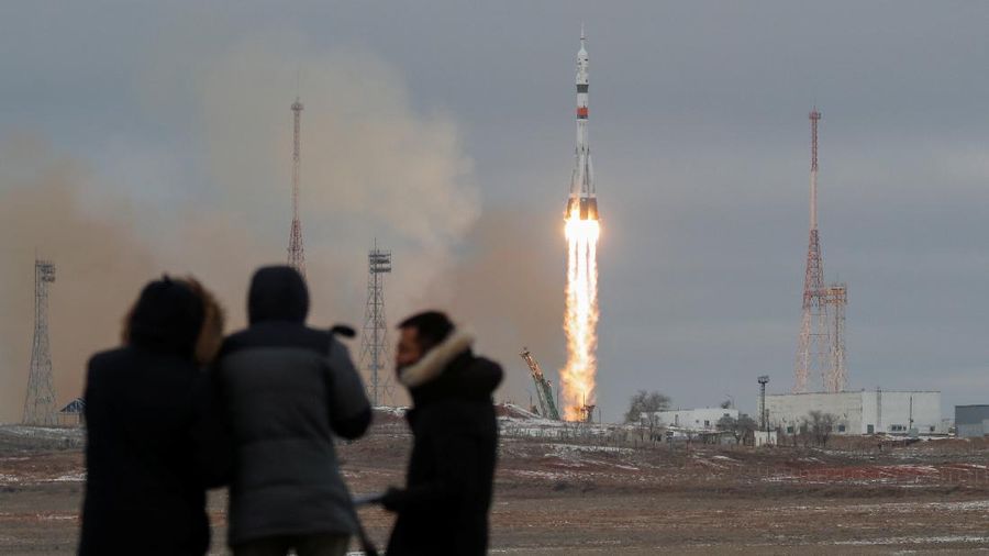 Japanese entrepreneur Yusaku Maezawa reacts as he speaks with his family after donning space suits shortly before the launch to the International Space Station (ISS) at the Baikonur Cosmodrome, Kazakhstan, December 8, 2021.  REUTERS/Shamil Zhumatov