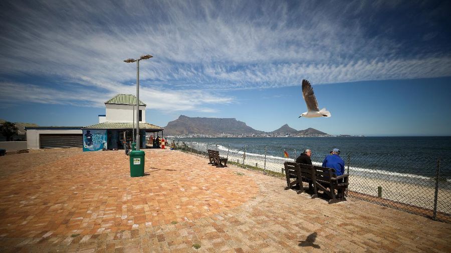Empty recliners are seen at the popular Camps Bay Beach as numbers of international tourists decline following recent coronavirus disease (COVID-19) travel restrictions, in Cape Town, South Africa, December 3, 2021. Picture taken December 3, 2021. REUTERS/Mike Hutchings