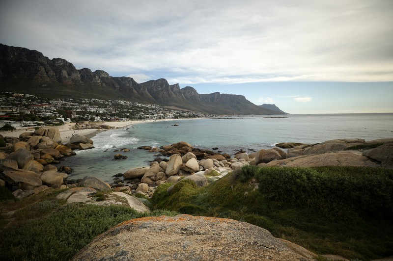 Empty recliners are seen at the popular Camps Bay Beach as numbers of international tourists decline following recent coronavirus disease (COVID-19) travel restrictions, in Cape Town, South Africa, December 3, 2021. Picture taken December 3, 2021. REUTERS/Mike Hutchings