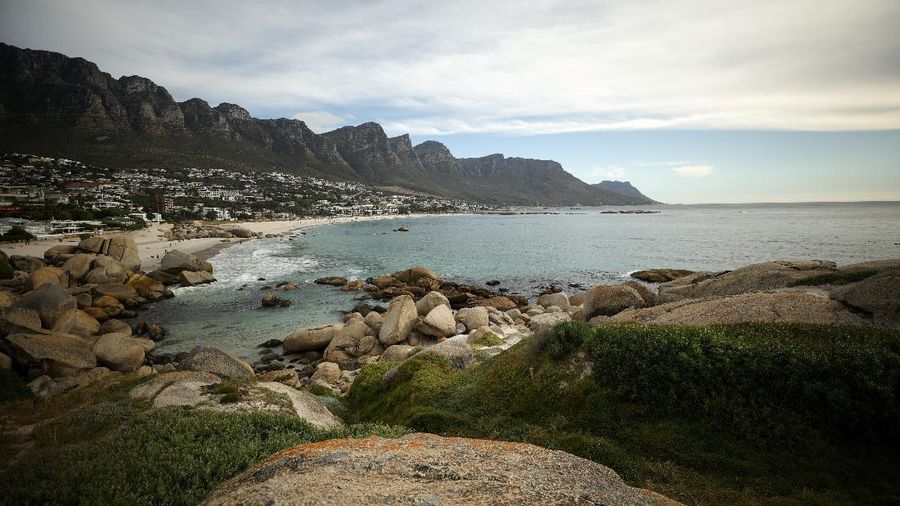 Empty recliners are seen at the popular Camps Bay Beach as numbers of international tourists decline following recent coronavirus disease (COVID-19) travel restrictions, in Cape Town, South Africa, December 3, 2021. Picture taken December 3, 2021. REUTERS/Mike Hutchings