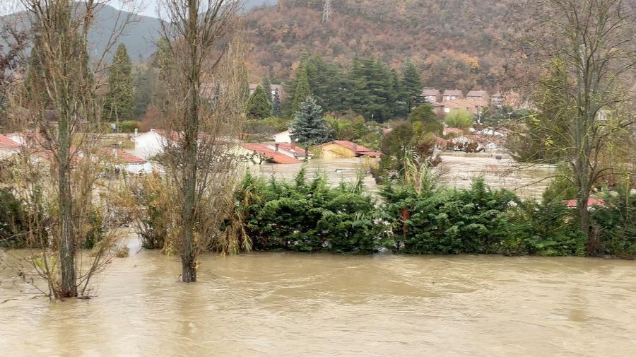 A man rides a kayak on a flooded road, following heavy rainfall in Pamplona, Spain, December 10, 2021. REUTERS/Vincent West