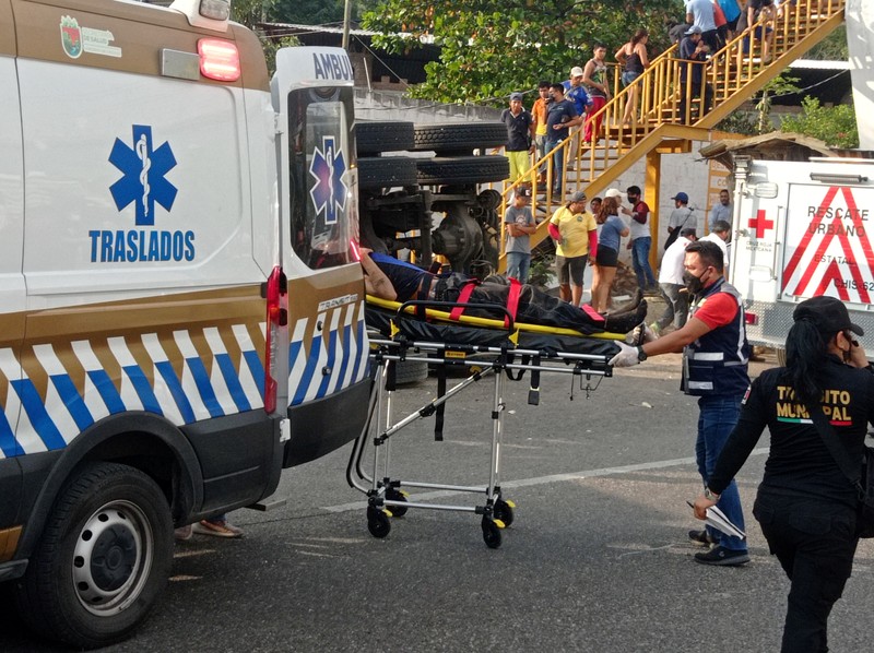 An overturned truck is seen after a trailer crash in the southern Mexican state of Chiapas killed at least 49 people, most of them migrants from Central America, officials said on Thursday, in Tuxtla Gutierrez, Chiapas, Mexico December 9, 2021, in this picture obtained from social media. Mandatory credit El La Mira/via REUTERS ATTENTION EDITORS - THIS IMAGE HAS BEEN SUPPLIED BY A THIRD PARTY. MANDATORY CREDIT. NO RESALES. NO ARCHIVES.