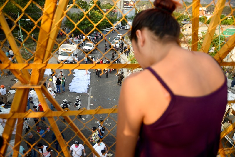 An overturned truck is seen after a trailer crash in the southern Mexican state of Chiapas killed at least 49 people, most of them migrants from Central America, officials said on Thursday, in Tuxtla Gutierrez, Chiapas, Mexico December 9, 2021, in this picture obtained from social media. Mandatory credit El La Mira/via REUTERS ATTENTION EDITORS - THIS IMAGE HAS BEEN SUPPLIED BY A THIRD PARTY. MANDATORY CREDIT. NO RESALES. NO ARCHIVES.