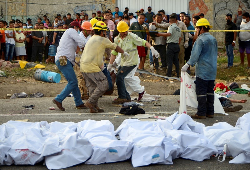 An overturned truck is seen after a trailer crash in the southern Mexican state of Chiapas killed at least 49 people, most of them migrants from Central America, officials said on Thursday, in Tuxtla Gutierrez, Chiapas, Mexico December 9, 2021, in this picture obtained from social media. Mandatory credit El La Mira/via REUTERS ATTENTION EDITORS - THIS IMAGE HAS BEEN SUPPLIED BY A THIRD PARTY. MANDATORY CREDIT. NO RESALES. NO ARCHIVES.