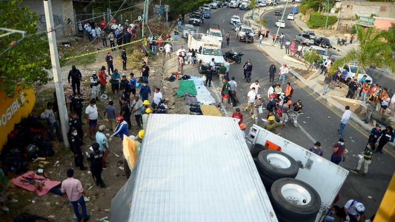 An overturned truck is seen after a trailer crash in the southern Mexican state of Chiapas killed at least 49 people, most of them migrants from Central America, officials said on Thursday, in Tuxtla Gutierrez, Chiapas, Mexico December 9, 2021, in this picture obtained from social media. Mandatory credit El La Mira/via REUTERS ATTENTION EDITORS - THIS IMAGE HAS BEEN SUPPLIED BY A THIRD PARTY. MANDATORY CREDIT. NO RESALES. NO ARCHIVES.