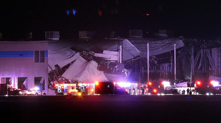 The Amazon distribution center is partially collapsed after being hit by a tornado on Friday, Dec. 10, 2021 in Edwardsville, Ill.  (Robert Cohen/St. Louis Post-Dispatch via AP)