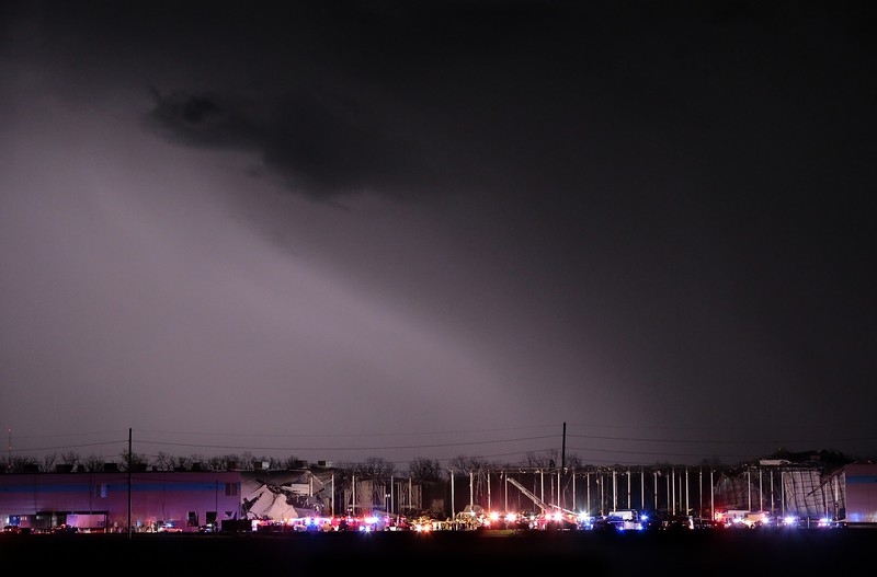 The Amazon distribution center is partially collapsed after being hit by a tornado on Friday, Dec. 10, 2021 in Edwardsville, Ill.  (Robert Cohen/St. Louis Post-Dispatch via AP)