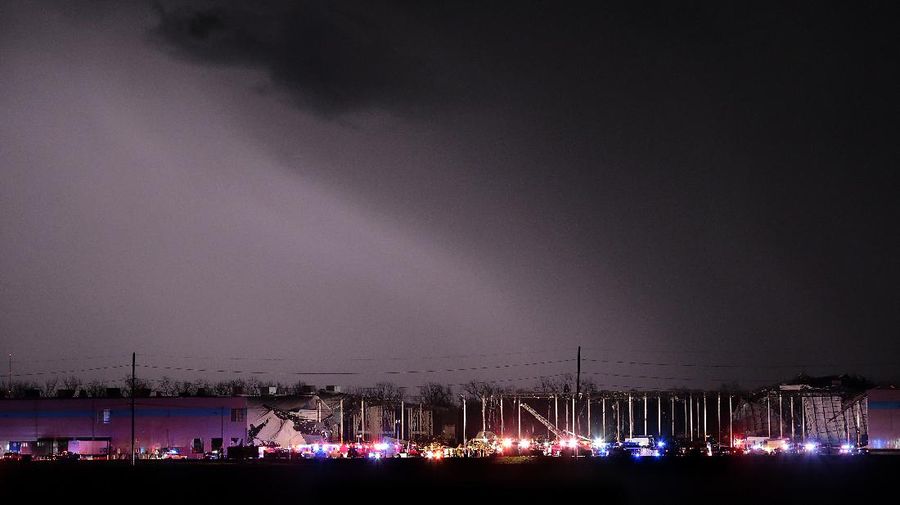 The Amazon distribution center is partially collapsed after being hit by a tornado on Friday, Dec. 10, 2021 in Edwardsville, Ill.  (Robert Cohen/St. Louis Post-Dispatch via AP)