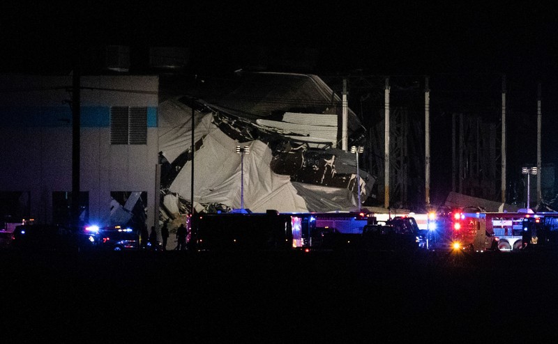 The Amazon distribution center is partially collapsed after being hit by a tornado on Friday, Dec. 10, 2021 in Edwardsville, Ill.  (Robert Cohen/St. Louis Post-Dispatch via AP)