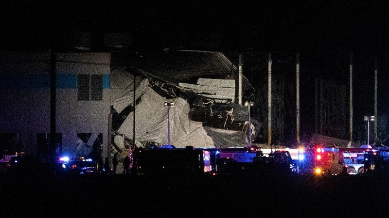 The Amazon distribution center is partially collapsed after being hit by a tornado on Friday, Dec. 10, 2021 in Edwardsville, Ill.  (Robert Cohen/St. Louis Post-Dispatch via AP)