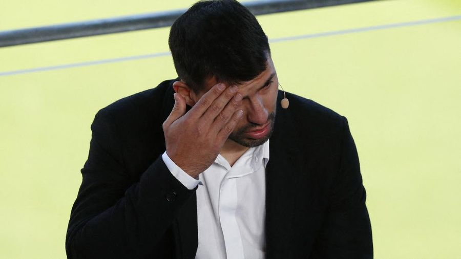 Soccer Football - FC Barcelona - Sergio Aguero Press Conference - Camp Nou, Barcelona, Spain - December 15, 2021 FC Barcelona's Sergio Aguero reacts after announcing his retirement from football during the press conference REUTERS/Albert Gea
