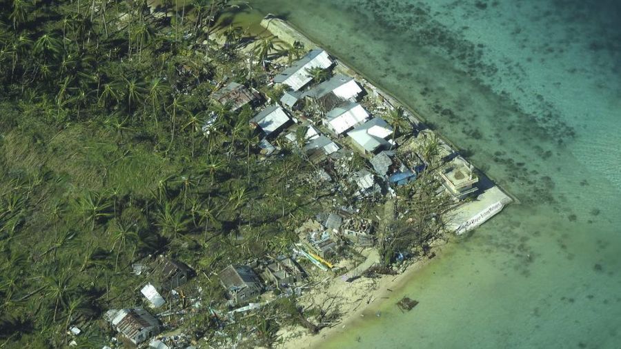 Foto udara menunjukkan, Filipina diterjang badai Topan Rai. AP/