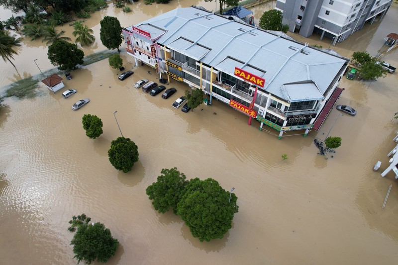 Suasana banjir di Malaysia. (via REUTERS/iainaazhr (TikTok)/Aina Syafiqa) Suasana banjir di Malaysia. (via REUTERS/iainaazhr (TikTok)/Aina Syafiqa)