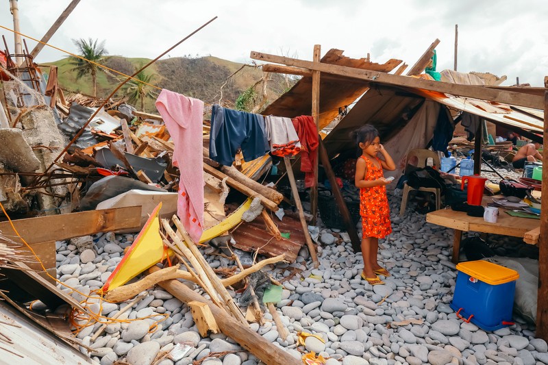 Dampak Topan Rai di kota Surigao. (via REUTERS/JILSON TIU/GREENPEACE)
