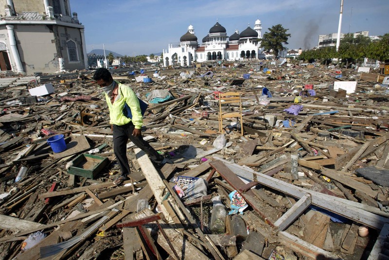 Tsunami A Look Back Photo Gallery FILE - In this Jan. 30, 2005 file photo, an aerial view shows the Rahmatullah Lampuuk mosque in the village of Lhoknga, near Banda Aceh, Indonesia. Friday marks the 10th anniversary of one of the deadliest natural disasters in world history: a tsunami, triggered by a massive earthquake off the Indonesian coast, leaving more than 230,000 people dead in 14 countries and causing about $10 billion in damage. Countries from Indonesia to India to Africa's east coast were hit, leaving shocking scenes of death and destruction. (AP Photo/Greg Baker, File)