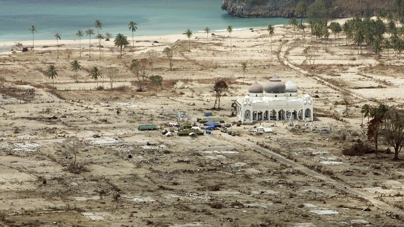 FILE - In this Jan. 30, 2005 file photo, an aerial view shows the Rahmatullah Lampuuk mosque in the village of Lhoknga, near Banda Aceh, Indonesia. Friday marks the 10th anniversary of one of the deadliest natural disasters in world history: a tsunami, triggered by a massive earthquake off the Indonesian coast, leaving more than 230,000 people dead in 14 countries and causing about $10 billion in damage. Countries from Indonesia to India to Africa's east coast were hit, leaving shocking scenes of death and destruction. (AP Photo/Greg Baker, File)