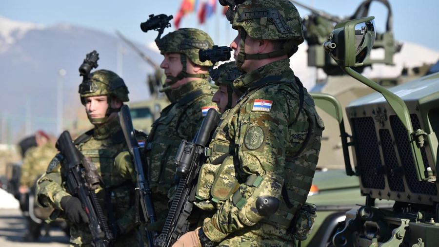 Members of Croatian KFOR contingent are pictured during a Croatia's President Zoran Milanovic's visit in Peja, Kosovo, December 24, 2021. REUTERS/Laura Hasani
