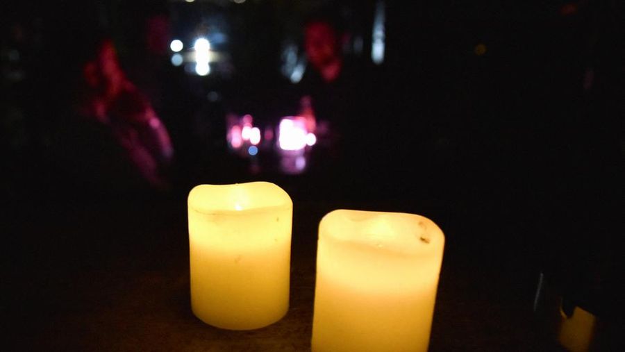 Candles are pictured at a bar during the power cut in Pristina, Kosovo, December 27, 2021. Picture taken December 27, 2021. REUTERS/Laura Hasani