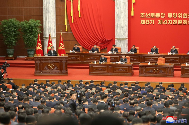 North Korean leader Kim Jong Un attends a plenary meeting of the Central Committee of the ruling Workers' Party in this photo released on December 28, 2021 by North Korea's Korean Central News Agency (KCNA). KCNA/via REUTERS. ATTENTION EDITORS - THIS IMAGE WAS PROVIDED BY A THIRD PARTY. REUTERS IS UNABLE TO INDEPENDENTLY VERIFY THIS IMAGE. NO THIRD PARTY SALES. SOUTH KOREA OUT.