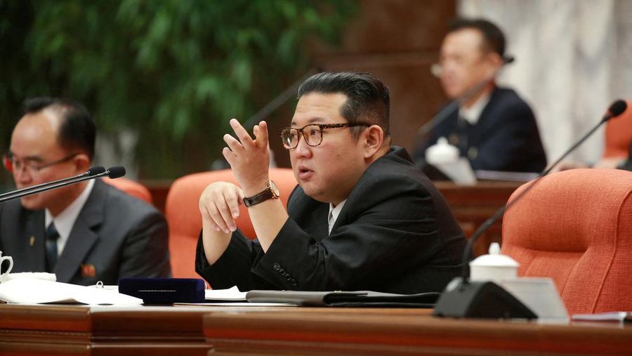 North Korean leader Kim Jong Un chairs a session of the 4th plenary meeting of the 8th Central Committee of the Workers' Party of Korea (WPK), in this photo released on December 29, 2021 by North Korea's Korean Central News Agency (KCNA).  KCNA/via REUTERS    ATTENTION EDITORS - THIS IMAGE WAS PROVIDED BY A THIRD PARTY. REUTERS IS UNABLE TO INDEPENDENTLY VERIFY THIS IMAGE. NO THIRD PARTY SALES. SOUTH KOREA OUT. NO COMMERCIAL OR EDITORIAL SALES IN SOUTH KOREA.