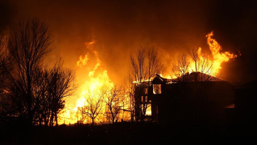 Homes burn as wildfires rip through a development Thursday, Dec. 30, 2021, in Superior, Colo. (AP Photo/David Zalubowski)