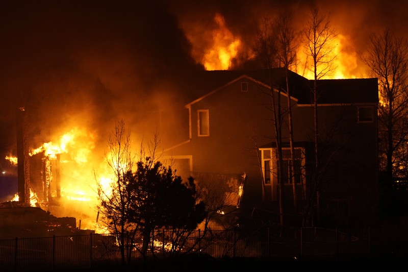 Structures burn, including an Element Hotel, as a wind-driven wildfire forced evacuation of the Superior suburb of Boulder, Colorado, U.S. December 30, 2021.  Trevor Hughes/USA TODAY NETWORK via REUTERS
NO RESALES. NO ARCHIVES MANDATORY CREDIT
     TPX IMAGES OF THE DAY