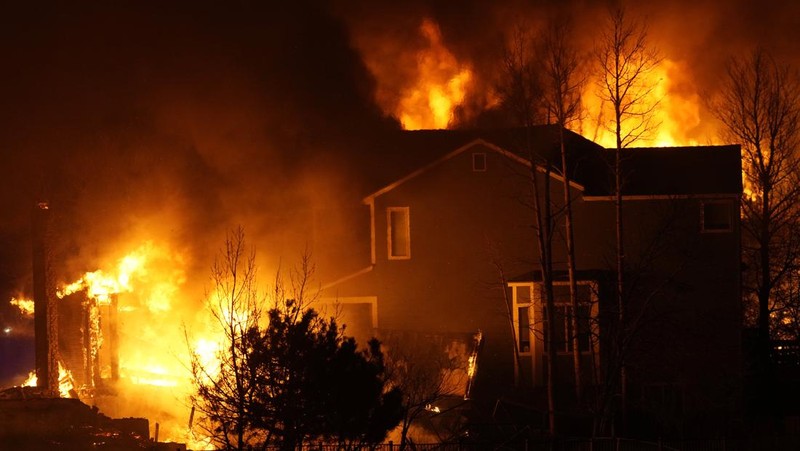 Structures burn, including an Element Hotel, as a wind-driven wildfire forced evacuation of the Superior suburb of Boulder, Colorado, U.S. December 30, 2021.  Trevor Hughes/USA TODAY NETWORK via REUTERS
NO RESALES. NO ARCHIVES MANDATORY CREDIT
     TPX IMAGES OF THE DAY