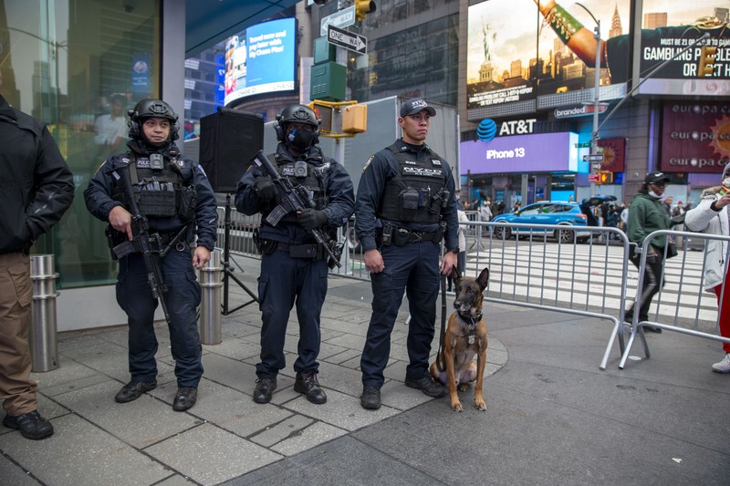 New Years Eve Times Square NYPD Chief of Counterterrorism Martine Materasso walks in Times Square in New York City on Thursday, Dec. 30, 2021. Officers from the Counterterrorism Bureau and other NYPD units will patrol during the New Year's Eve bash on Friday. The city is permitting a smaller crowd than before the pandemic and revelers must wear face masks and prove they have been vaccinated. (AP Photo/Ted Shaffrey)