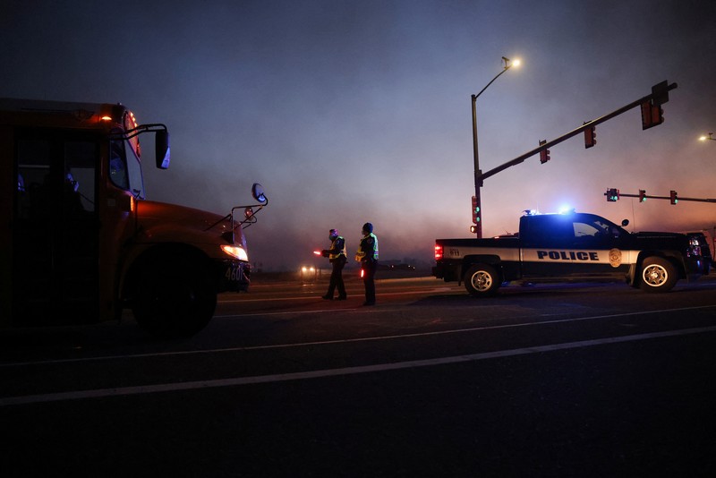 Structures burn, including an Element Hotel, as a wind-driven wildfire forced evacuation of the Superior suburb of Boulder, Colorado, U.S. December 30, 2021.  Trevor Hughes/USA TODAY NETWORK via REUTERS
NO RESALES. NO ARCHIVES MANDATORY CREDIT
     TPX IMAGES OF THE DAY