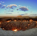 The crater fire named "Gates of Hell" is seen near Darvaza, Turkmenistan, Saturday, July 11, 2020. The president of Turkmenistan is calling for an end to one of the country's most notable but infernal sights — the blazing desert natural gas crater