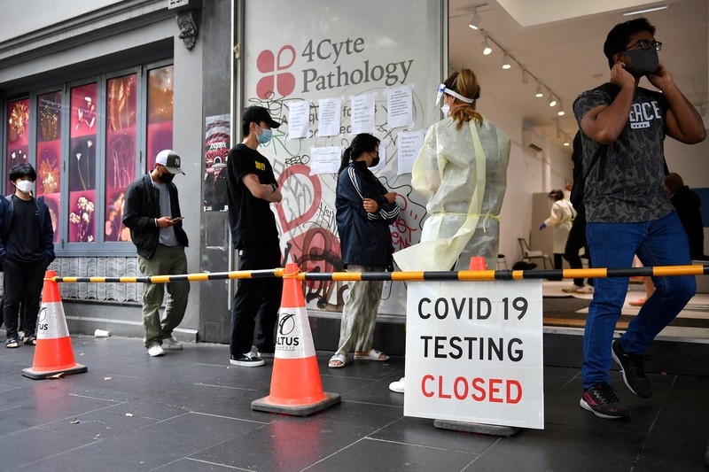 Lonjakan kasus covid di Australia (via REUTERS/STRINGER) Lonjakan kasus covid di Australia (via REUTERS/STRINGER)
