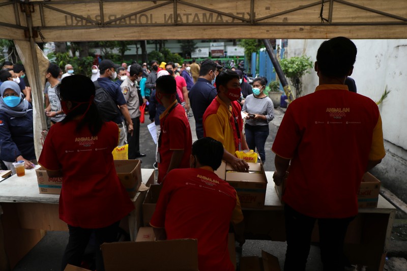 Bazar Minyak Goreng Murah (CNBC Indonesia/Tri Susilo) Bazar Minyak Goreng Murah (CNBC Indonesia/Tri Susilo)