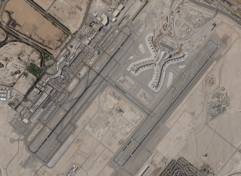 In this satellite image provided by Planet Labs PBC, white fire suppressing foam is seen after an attack on an Abu Dhabi National Oil Co. fuel depot in the Mussafah neighborhood of Abu Dhabi, United Arab Emirates, Monday, Jan. 17, 2022. A drone attack claimed by Yemen's Houthi rebels targeting a key oil facility in Abu Dhabi killed three people on Monday and sparked a fire at Abu Dhabi's international airport. (Planet Labs PBC via AP)