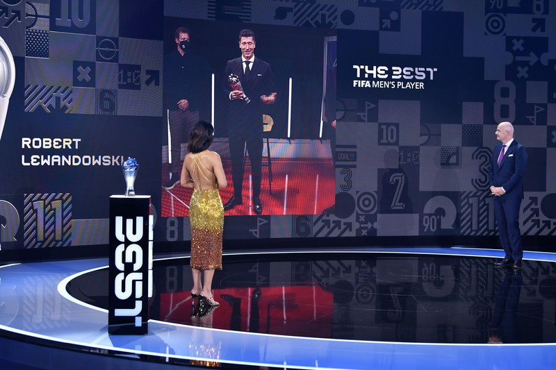 Switzerland Soccer FIFA Awards FIFA President Gianni Infantino speaks with the Best FIFA Men's Player 2021 award winner Robert Lewandowski during the Best FIFA Football Awards 2021 in Zurich, Switzerland, Monday, Jan. 17, 2022. (Harold Cunningham/Pool Photo via AP)