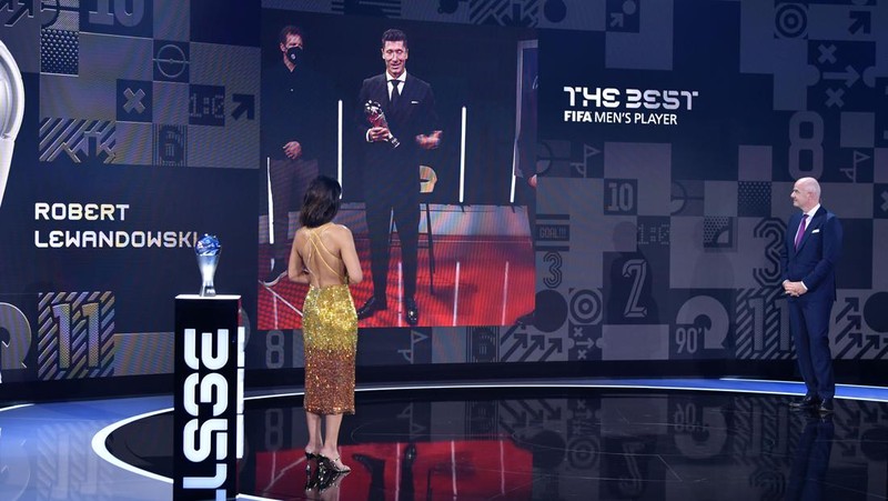 FIFA President Gianni Infantino speaks with the Best FIFA Men's Player 2021 award winner Robert Lewandowski during the Best FIFA Football Awards 2021 in Zurich, Switzerland, Monday, Jan. 17, 2022. (Harold Cunningham/Pool Photo via AP)