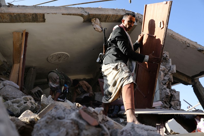 A view of a house hit by Saudi-led air strikes in Sanaa, Yemen, January 18, 2022. REUTERS/Khaled Abdullah